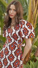 Load image into Gallery viewer, Puff Sleeve Midi Wrap Dress in Orange Geo Print
